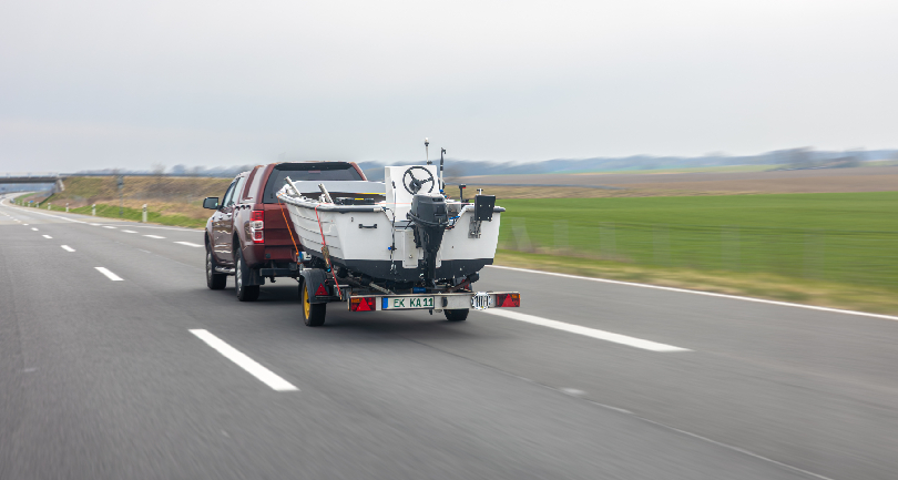 The technical mechanics of a modern car transport vehicle within an enclosed covered car transportation system